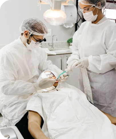 Dentists helping a patient